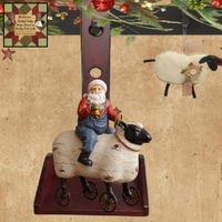 Santa Riding Sheep Folk Art