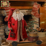 Santa Primitive Holding a Lantern on Wood Pull Wagon