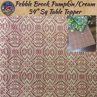 Pebble Brook Pumpkin & Cream Woven Table Top Collection
